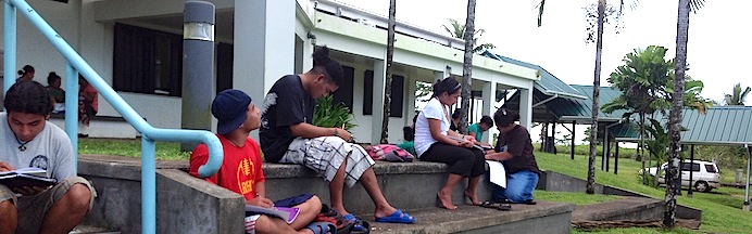 Art students drawing in front of LRC building